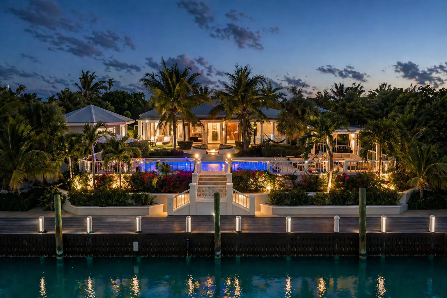 Below Deck villa in Turks and Caicos glowing at night.